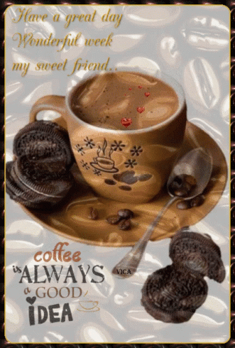 A Cup Of Coffee Sits On A Saucer Next To A Spoon And Cookies GIF