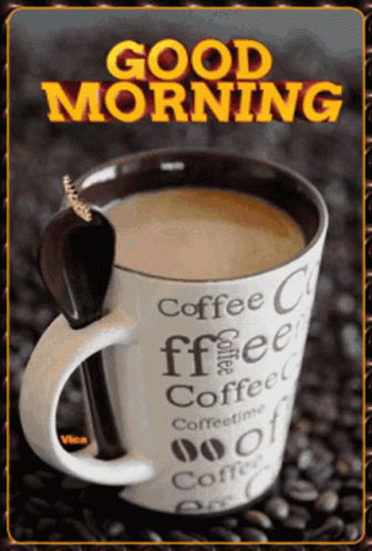 A Cup Of Coffee With A Spoon In It And The Words Good Morning GIF