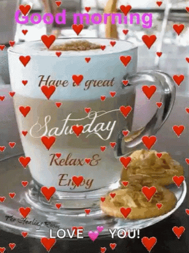 A Cup Of Coffee With Cookies On A Saucer And Hearts Around It . GIF