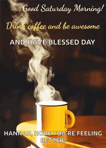 A Cup Of Coffee With Steam Coming Out Of It Is On A Table . GIF