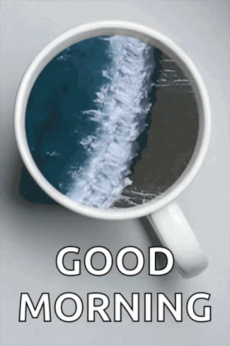 a cup of coffee with the words " good morning " on the bottom