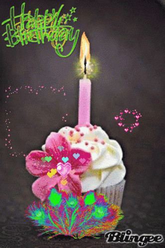 A Cupcake With A Lit Candle And The Words Happy Birthday On The Bottom GIF