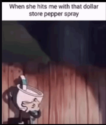 A Cuphead Cartoon Character Is Holding A Pepper Spray In His Hand . GIF