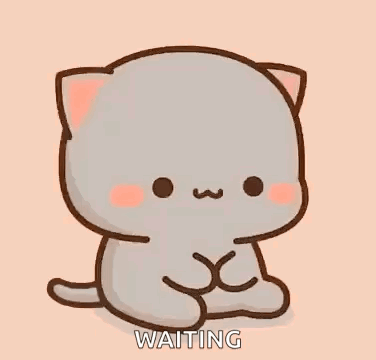 A Cute Cartoon Cat Is Sitting Down And Waiting For Something . GIF