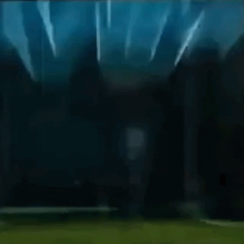 A Dark Background With A Light Shining Through It GIF