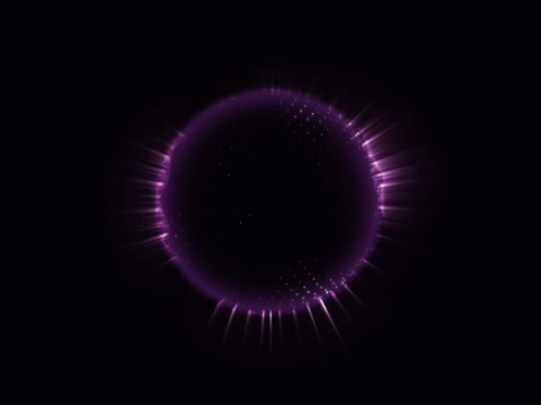 A Dark Background With A Purple Circle Of Light Coming Out Of It GIF