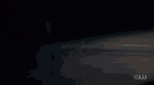 A Dark Background With The Letters Cw On The Bottom Right GIF