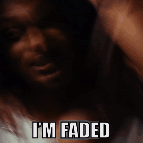 A Dark Background With The Words I 'M Faded In White Letters GIF
