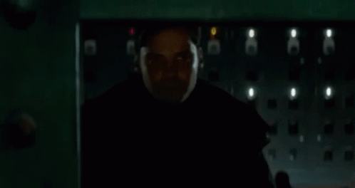 A Dark Room With A Lot Of Electrical Outlets And Buttons . GIF