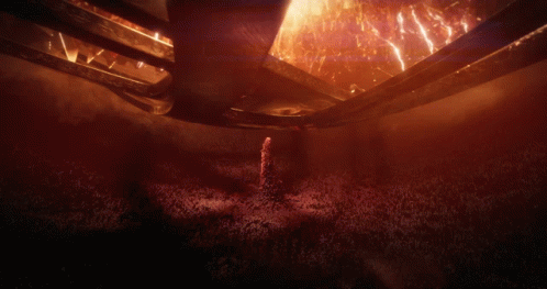 A Dark Room With A Lot Of Smoke And Flames GIF