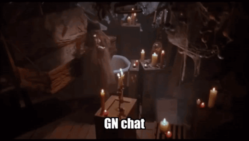 A Dark Room With Candles And The Words Gn Chat GIF