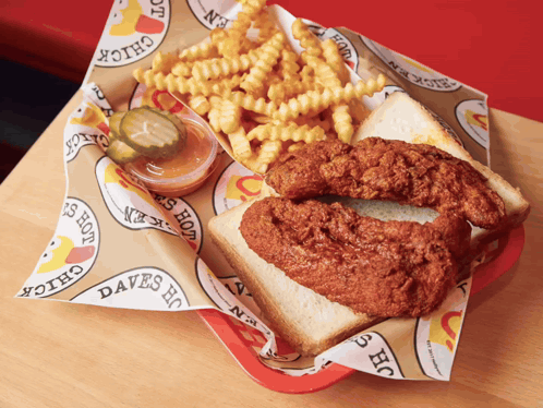 A Daves Hot Chicken Sandwich And French Fries GIF