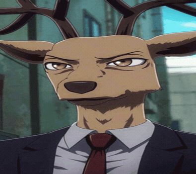 A Deer In A Suit And Tie With Antlers GIF
