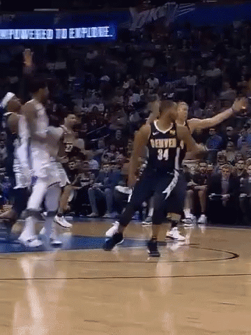 Denver Basketball Player Jumping During Game GIF