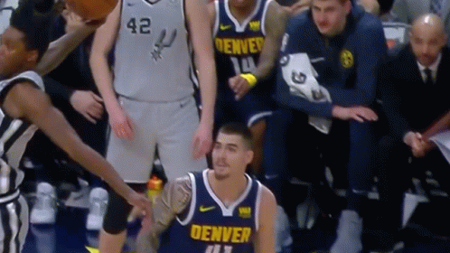 A Denver Basketball Player With The Number 41 On His Shirt GIF