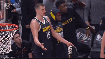 A Denver Nuggets Basketball Player Talks To Another Player GIF