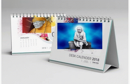A Desk Calendar For The Year 2018 Has A Picture Of A Man On It GIF