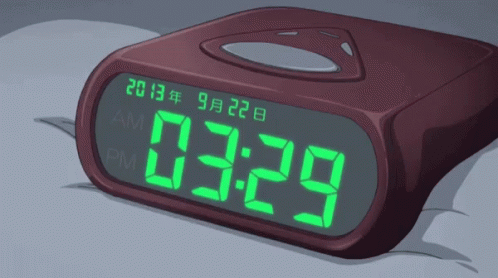 A Digital Clock Displays The Time Of 03:29 Am GIF