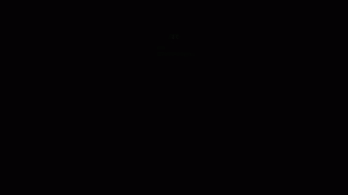 A Dimly Lit Hallway With A Sign That Says ' Exit ' On It GIF