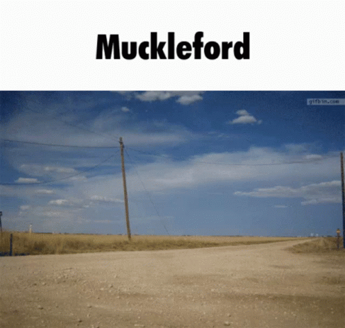 A Dirt Road With The Word Muckleford On The Top GIF