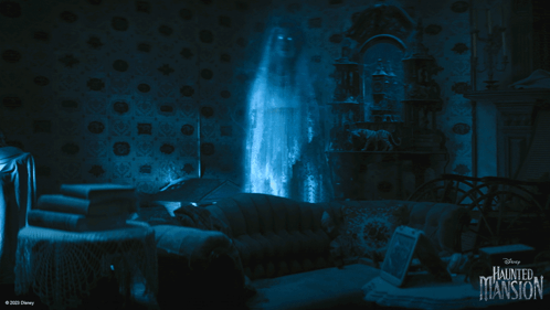 A Disney Haunted Mansion Poster With A Ghost Coming Out Of A Window GIF