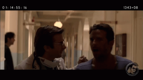 A Doctor And A Patient Are Talking In A Hallway And The Time Is 1434 08 GIF