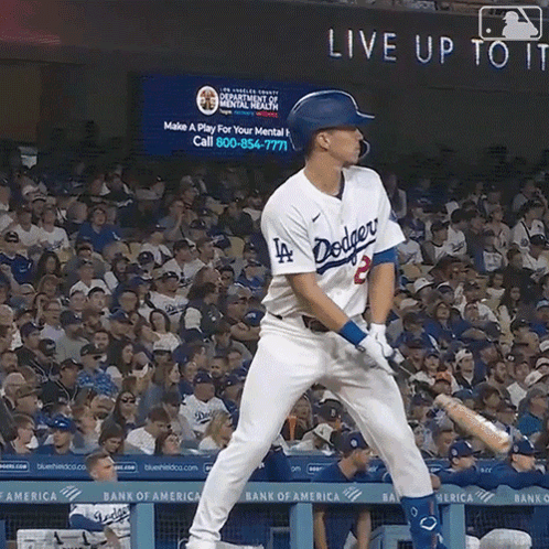 A Dodgers Baseball Player Getting Ready To Swing At A Pitch GIF