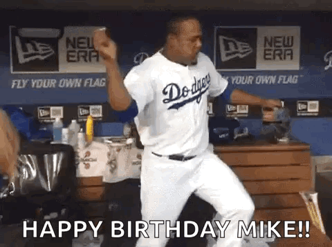 A Dodgers Baseball Player Is Dancing In The Dugout . GIF