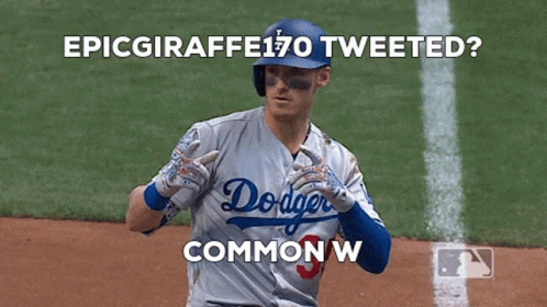 A Dodgers Baseball Player Is Running On A Baseball Field GIF