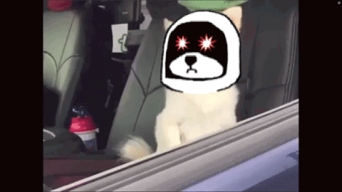 A Dog Wearing A Helmet With Red Eyes Is Sitting In A Car GIF