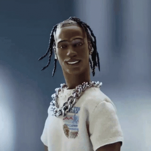 A Doll With Dreadlocks And A Chain Around His Neck Is Wearing A T-Shirt That Says ' Atlanta ' On It GIF