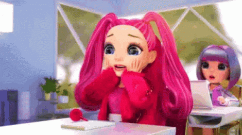 A Doll With Pink Hair Is Sitting At A Desk In A Classroom . GIF