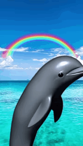 A Dolphin Jumping Out Of The Ocean With A Rainbow In The Background GIF