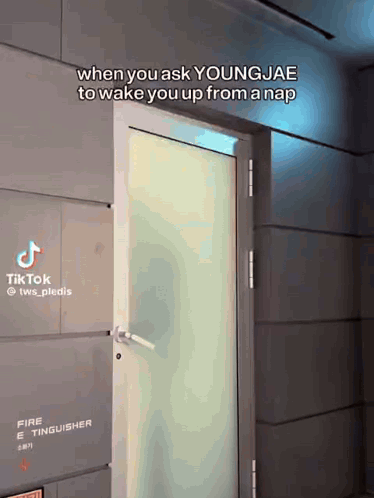 A Door With A Sign That Says Fire Extinguisher GIF
