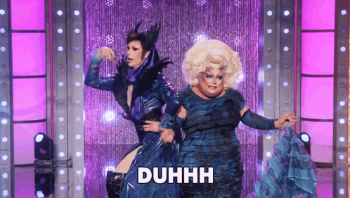 A Drag Queen Is Dancing With Another Drag Queen And The Word Duhhh Is On The Screen GIF
