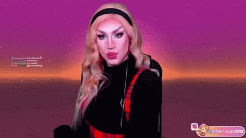 A Drag Queen Is Giving A Kiss In Front Of A Screen That Says ' Neueslacok ' On It GIF