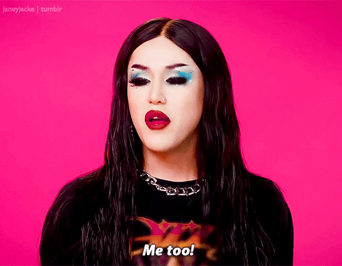 A Drag Queen Says Me Too In A Pink Background GIF