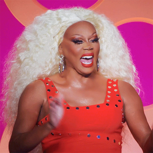 Drag Queen In Red Dress And Earrings GIF