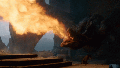 A Dragon Is Breathing Fire From Its Mouth GIF