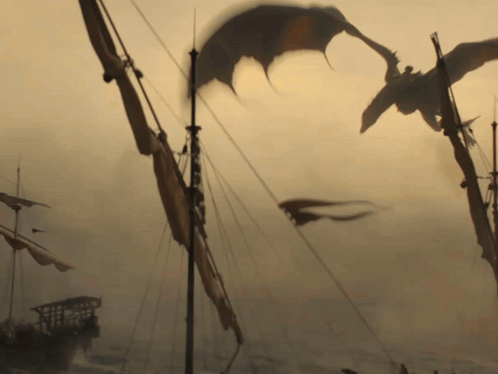 a dragon is flying over a boat in the fog