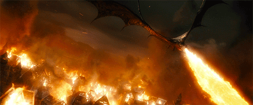 A Dragon Is Flying Over A Burning City With Flames Coming Out Of Its Mouth GIF