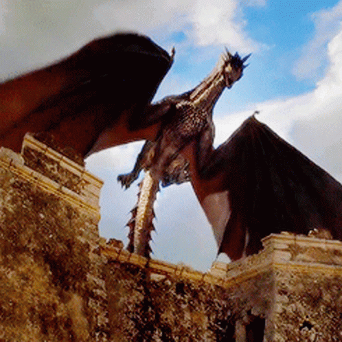 A Dragon Is Flying Over A Stone Wall In The Sky GIF