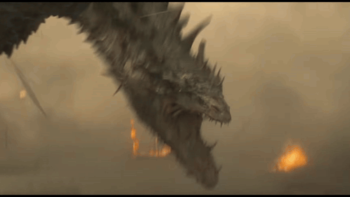a dragon is flying through the air with a fire in the background