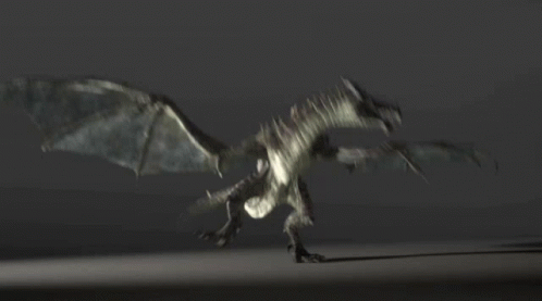 A Dragon Is Flying Through The Air With Its Wings Spread GIF