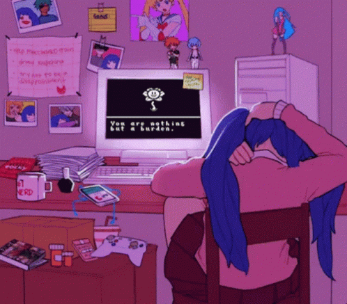A Drawing Of A Girl Sitting At A Desk With A Computer That Says You Are Nothing But A Burden On It GIF