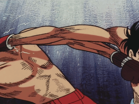 Man Wearing Boxing Gloves Number 11 GIF