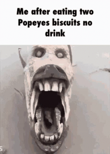 A Drawing Of A Monster With Its Mouth Open And The Words Me After Eating Two Popeyes Biscuits No Drink GIF