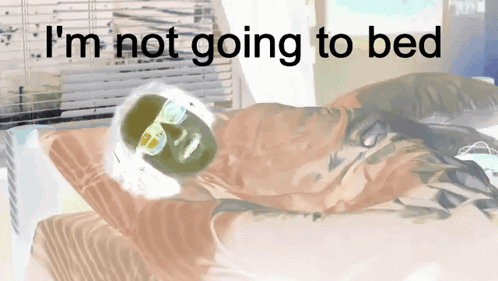 A Drawing Of A Person Laying On A Bed With The Words " I 'M Not Going To Bed " Above Them GIF