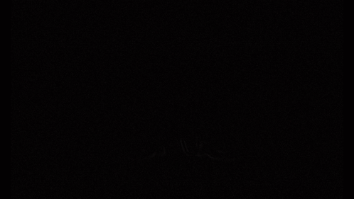 A Drawing Of An Owl 'S Eyes With A Red Star In The Middle GIF