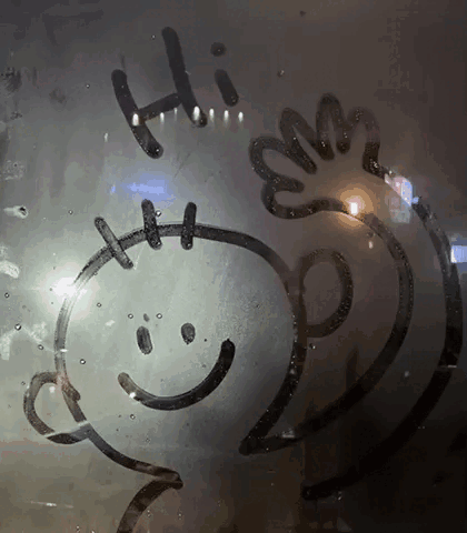 A Drawing On A Window That Says Hi And A Smiley Face GIF
